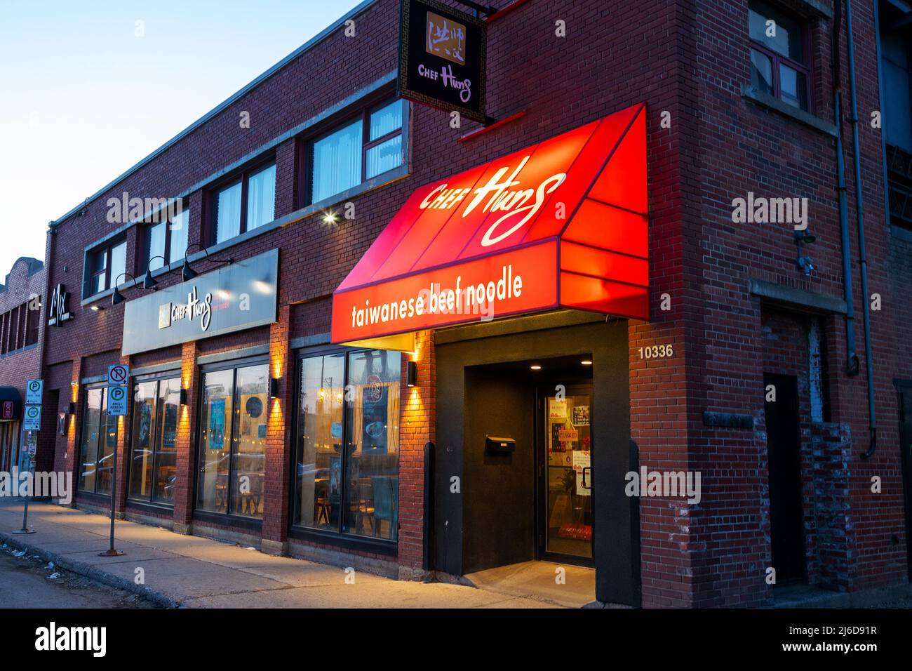 EDMONTON, CANADA - APRIL 17, 2022: Storefront of Chef Hung restaurant in Strathcona, Edmonton, Alberta. Since 2011, the famous Taiwanese beef noodle r Stock Photo