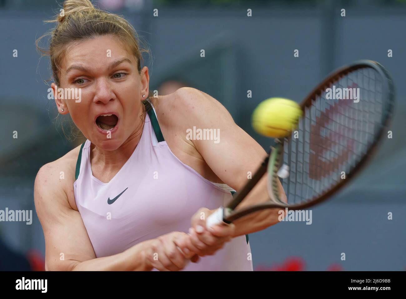 Simona Halep of Romania plays against Paula Badosa of Spain in her second  round match on Day 3 of the Mutua Madrid Open at La Caja Magica in Madrid. Simona  Halep beats
