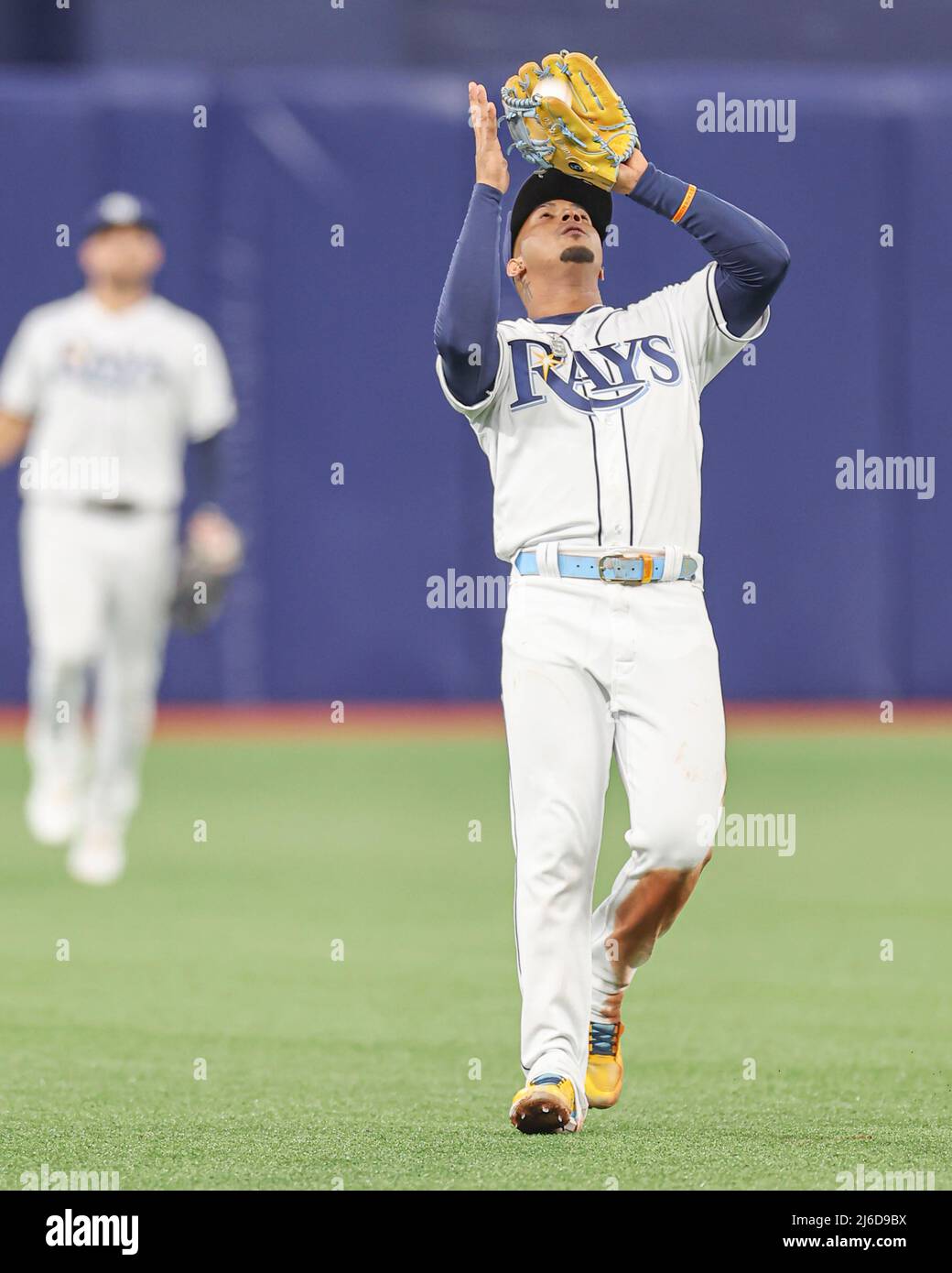 St. Petersburg, FL. USA;  Tampa Bay Rays shortstop Wander Franco (5) tracks down a shallow pop fly hit by Minnesota Twins relief pitcher Joe Smith (38 Stock Photo