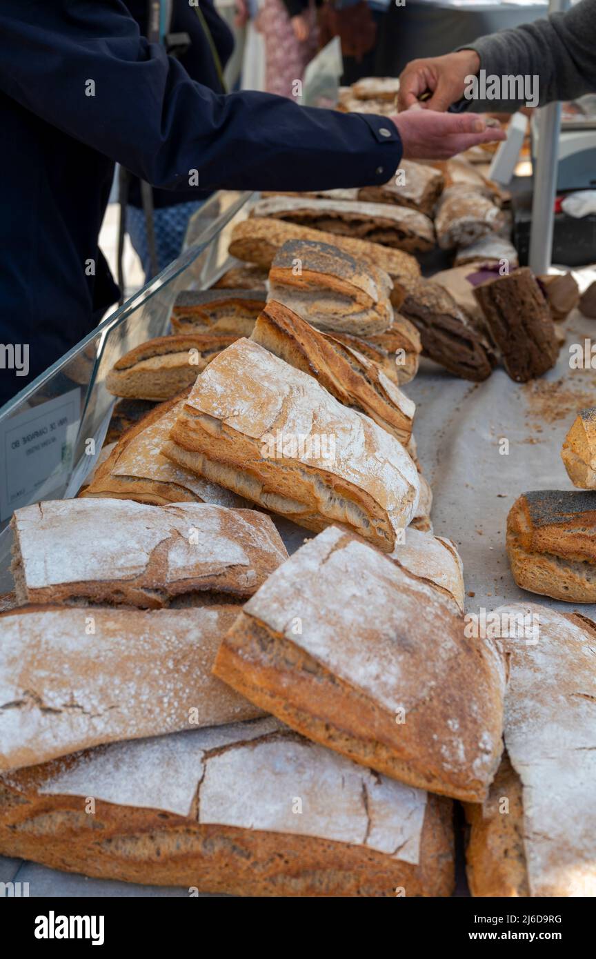 Sour dough bio bread made with natural yeast starter and baked in wood ...
