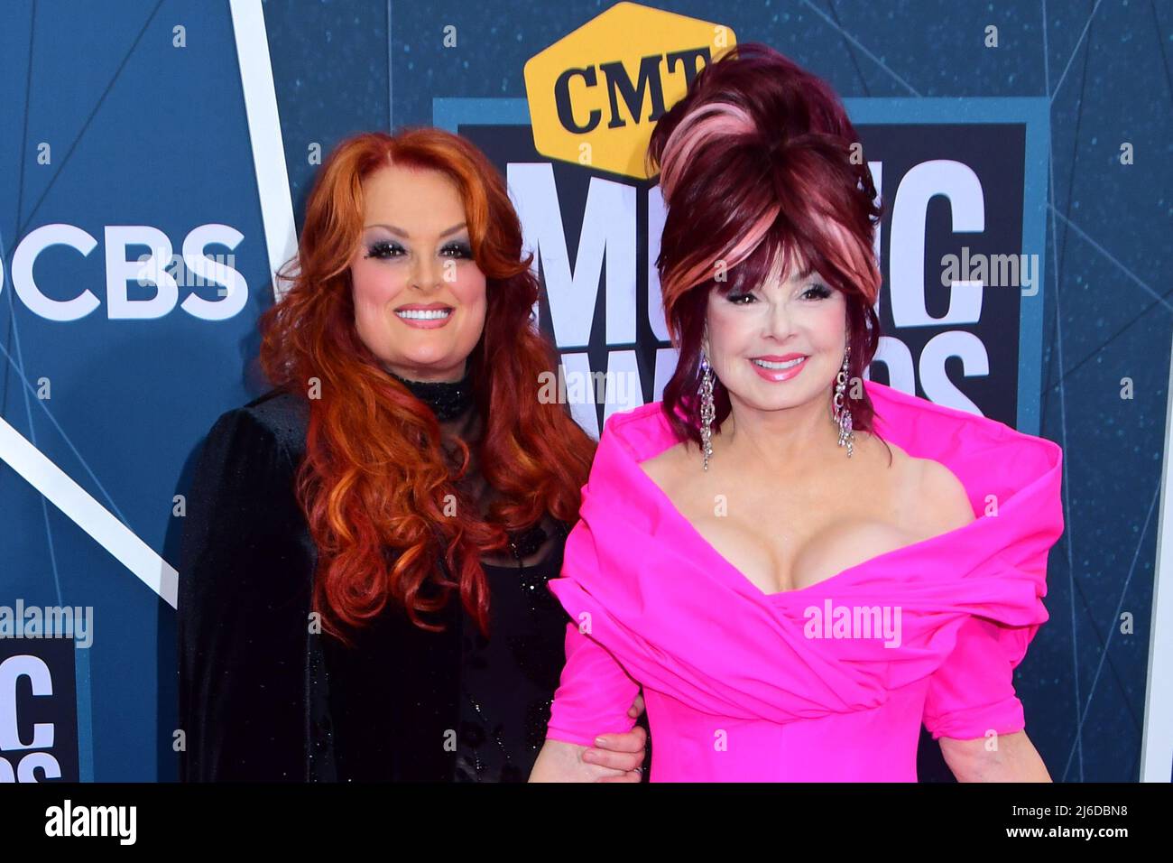30 April 2022 - Grammy-award winning artist Naomi Judd of The Judds has died at 76. With her daughter Wynonna Judd, she formed the highly successful singing duo known as the Judds. As country music's most famous motherÃdaughter team, the Judds scored twenty top-10 hits (including fifteen at number one) and went undefeated for eight consecutive years at all three major country music awards shows. In addition, the duo won five Grammy Awards and a vast array of other awards and honors. As a songwriter, Judd also won a Grammy for country song of the year with the Judds' hit ''Love Can Build a Bri Stock Photo
