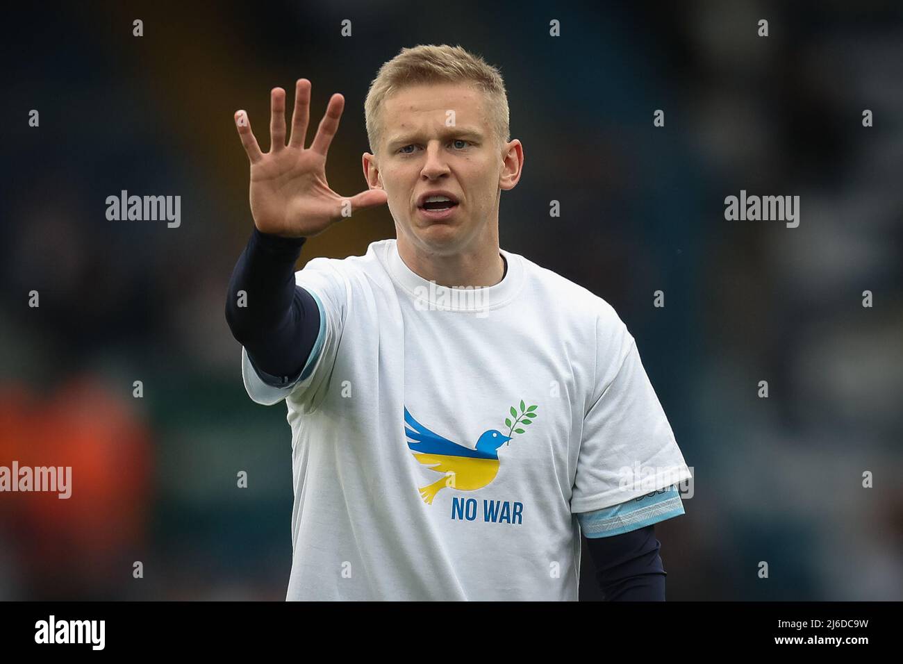 Oleksandr Zinchenko 11 of Manchester City holds his hand up whilst
