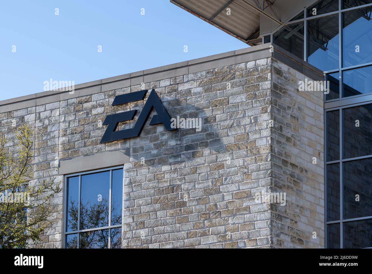 Austin,  Texas,  USA - March 18, 2022: EA logo sign on its office building in Austin,  Texas,  USA. Stock Photo