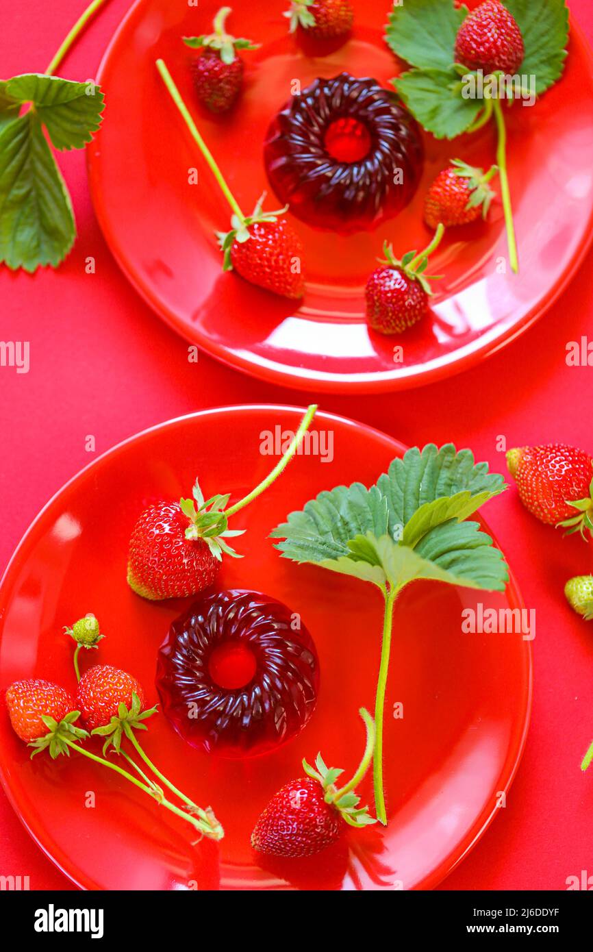 Strawberry jelly.Low calorie diet dessert.Red jelly and strawberries