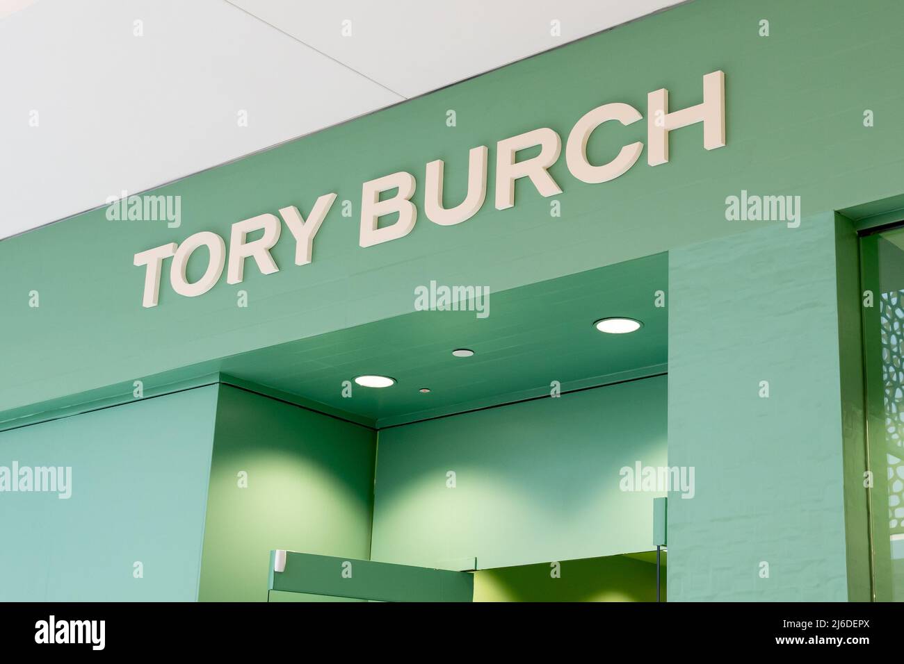 Houston, Texas, USA - February 25, 2022: A Tory Burch sign displayed over the entrance to the store in a shopping mall. Stock Photo