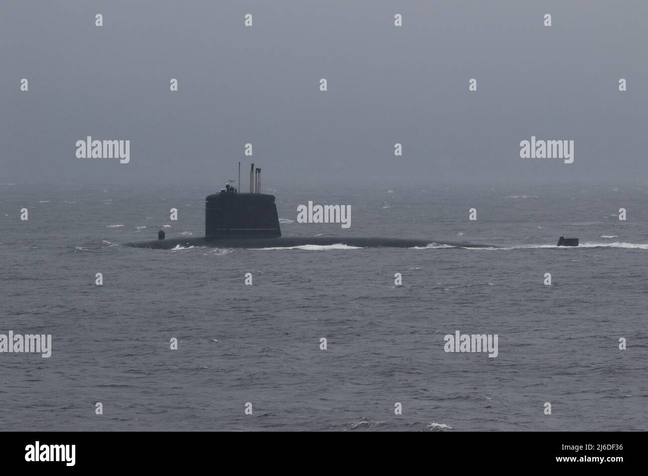 FS Casabianca (S603), a Rubis-class nuclear-powered attack submarine (SSN) operated by the French Navy, passing Gourock on the Firth of Clyde on a dull and dreary day, shortly after her departure from the Faslane naval base. Stock Photo