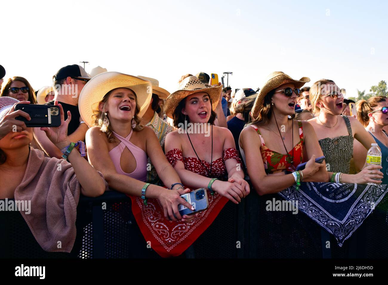 Indio, California, April 30, 2022 - The crowd having fun at Stagecoach Country Music Festival. Credit: Ken Howard/Alamy Live News Stock Photo
