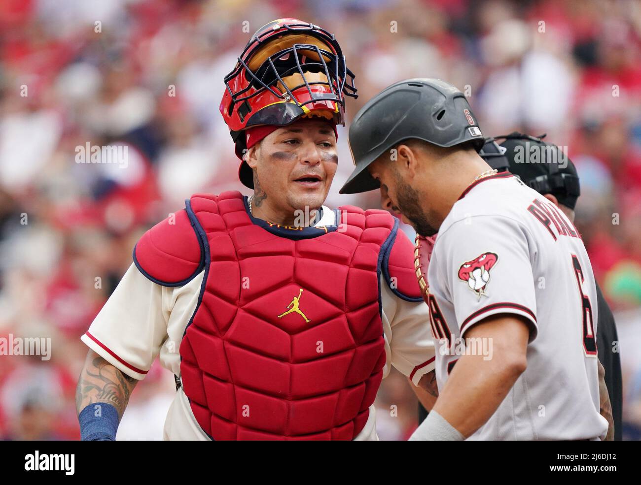 St. Louis Cardinals catcher Yadier Molina chats with Arizona