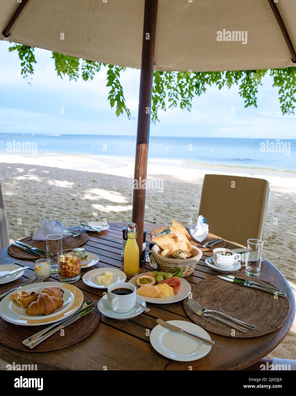 breakfast on the beach of a luxury resort during vacation. luxury holiday with breakfast on the