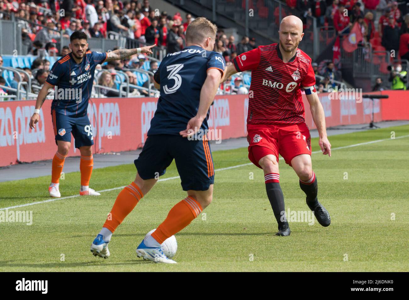 Michael Bradley (4) and John Nelson (3) in action during the MLS game between Toronto FC and FC Cincinnati at BMO Field. (Final score; Toronto FC 1:2 FC Cincinnati) (Photo by Angel Marchini / SOPA Images/Sipa USA) Stock Photo