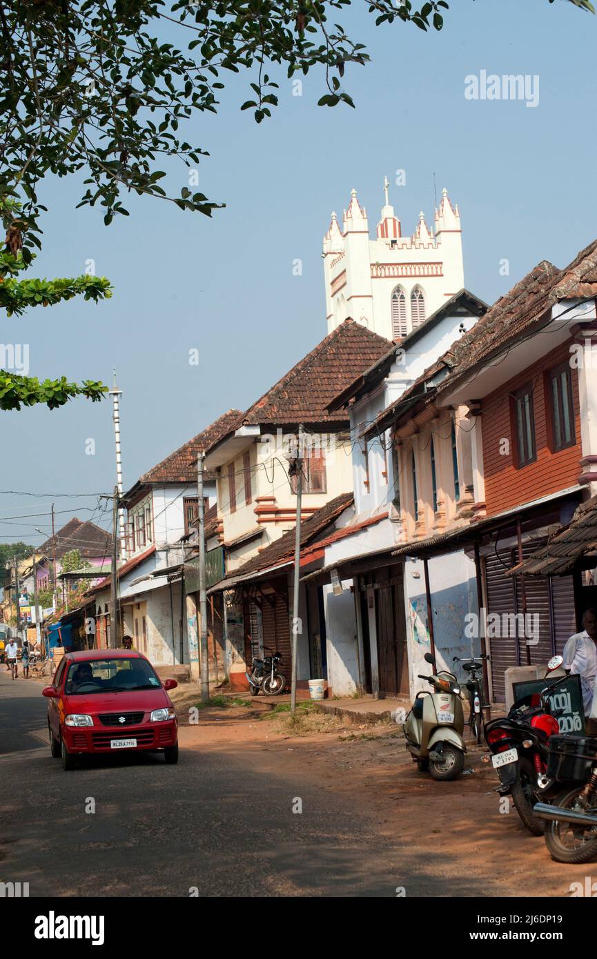 Traditional tiled roof houses and shops on market road of Alappuzha