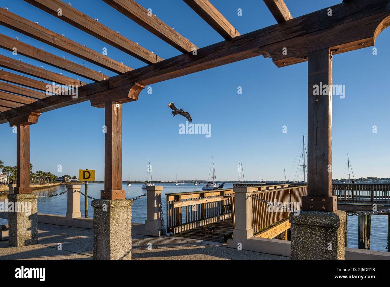 Waterfront trellis and dock along the Matanzas Bay waterfront in Old City St. Augustine, Florida. (USA) Stock Photo