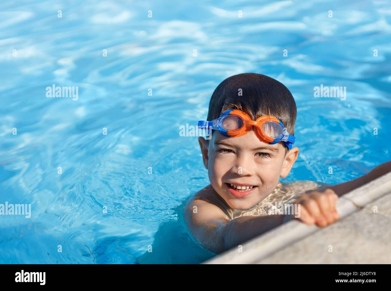 Young boy in pool hires stock photography and images Alamy