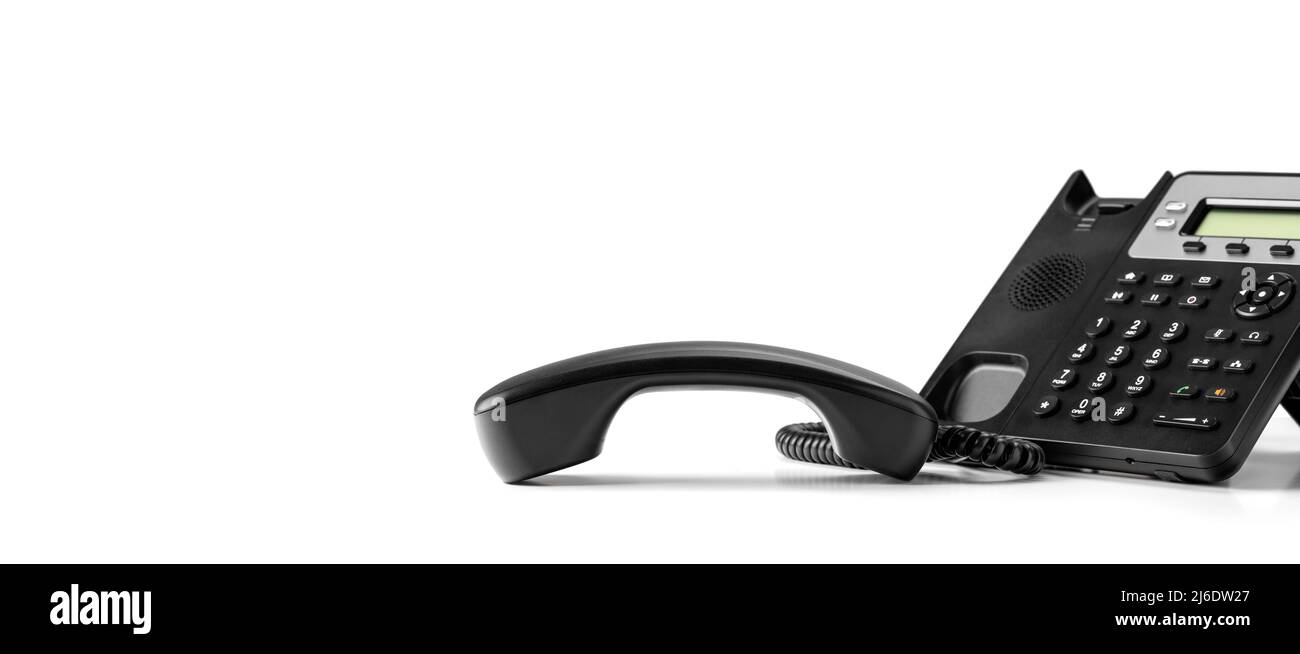contact us. black office voip phone with handset up isolated on white