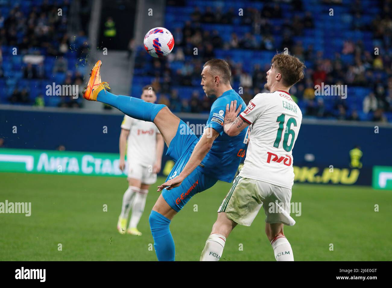 Artem Dzyuba (No.22) of Zenit and Tin Jedvaj (No.16) of Lokomotiv seen