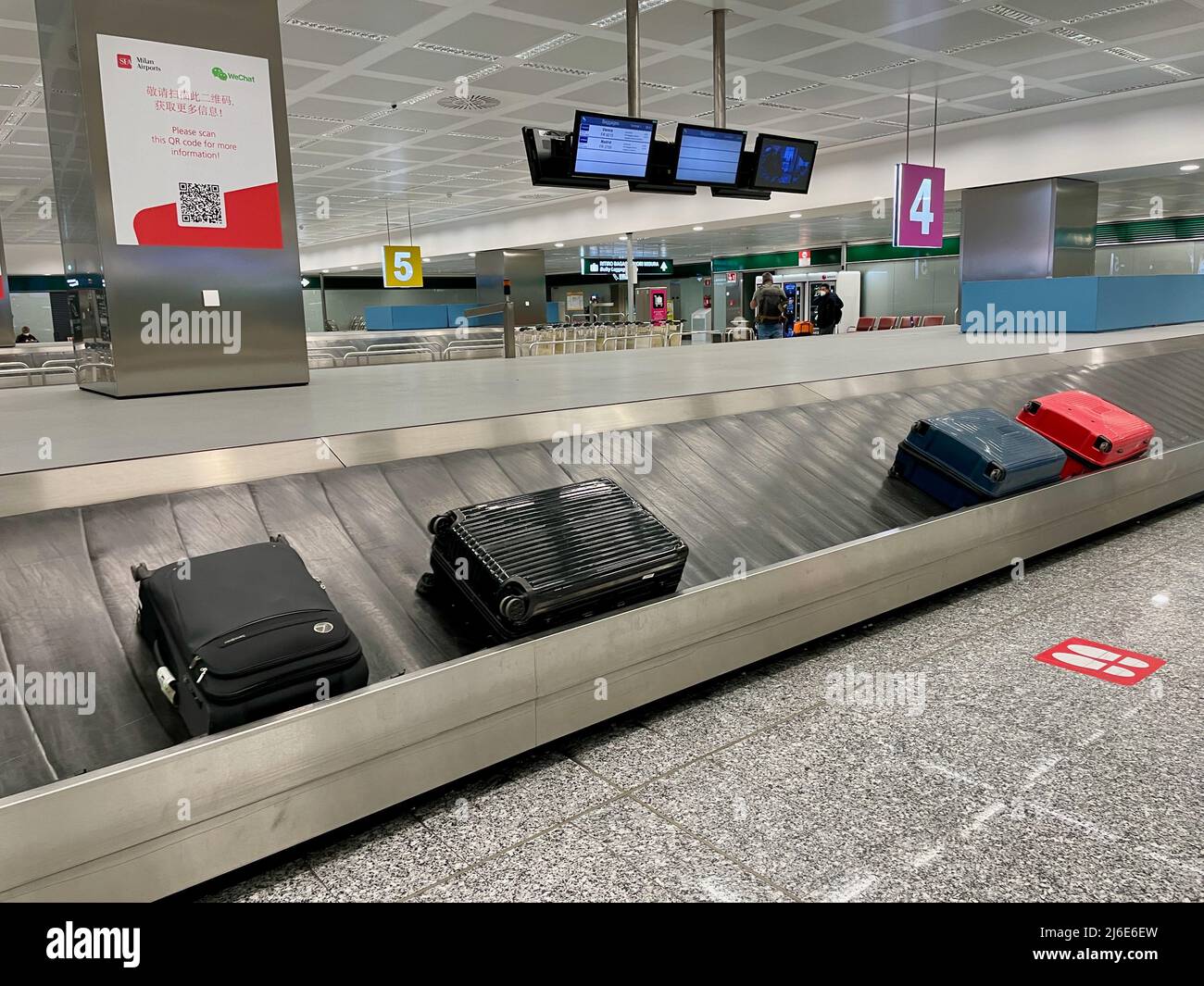 Milan, Italy, 19.04.2022. Baggage claim at Malpensa International Airport. High quality photo Stock Photo
