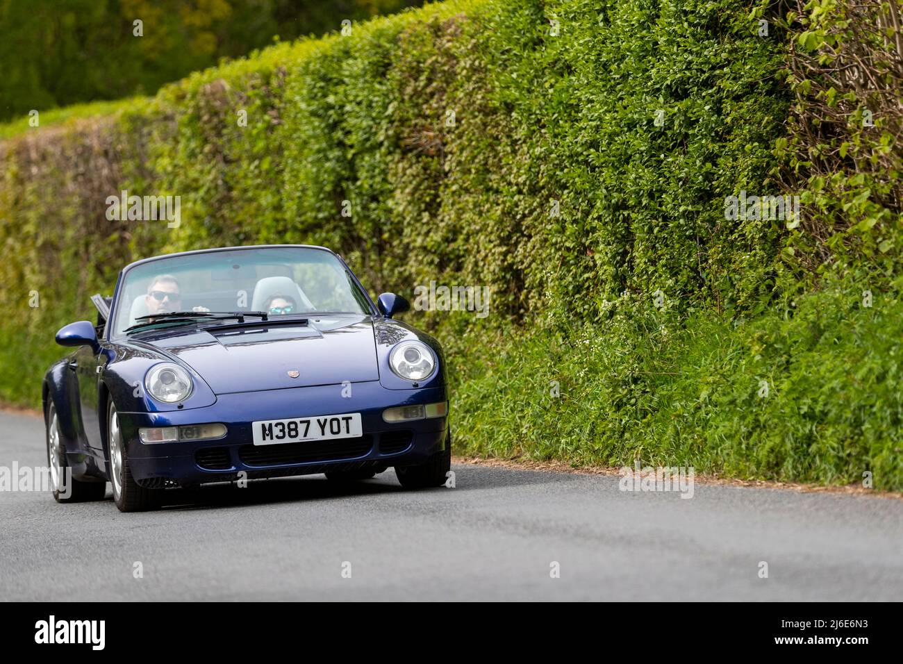 Porsche convertible taking part in the classic cars springtime Rotary