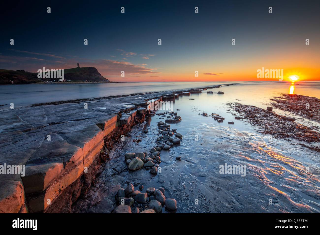 Winter Sunset in Kimmeridge Bay, Dorset taken  on December 27th 2019 at 4pm in the afternoon when all the Christmas crowds had gone home. Stock Photo