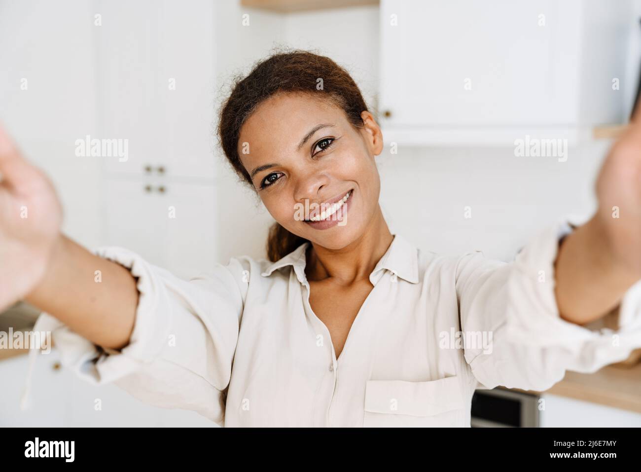 Smiling black woman taking hi-res stock photography and images - Alamy