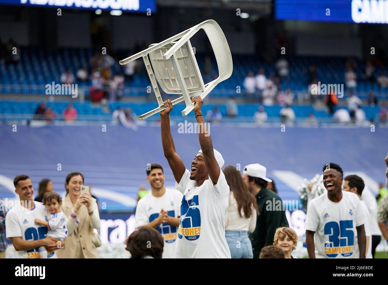 David Alaba of Real Madrid celebrates with a chair at full time during