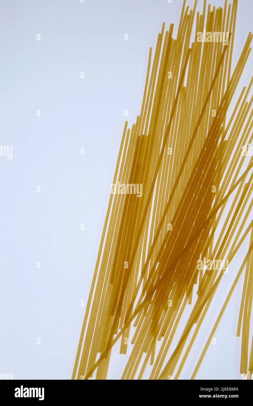 Dry pasta spaghetti and fusilli on white background May 2022 Stock Photo