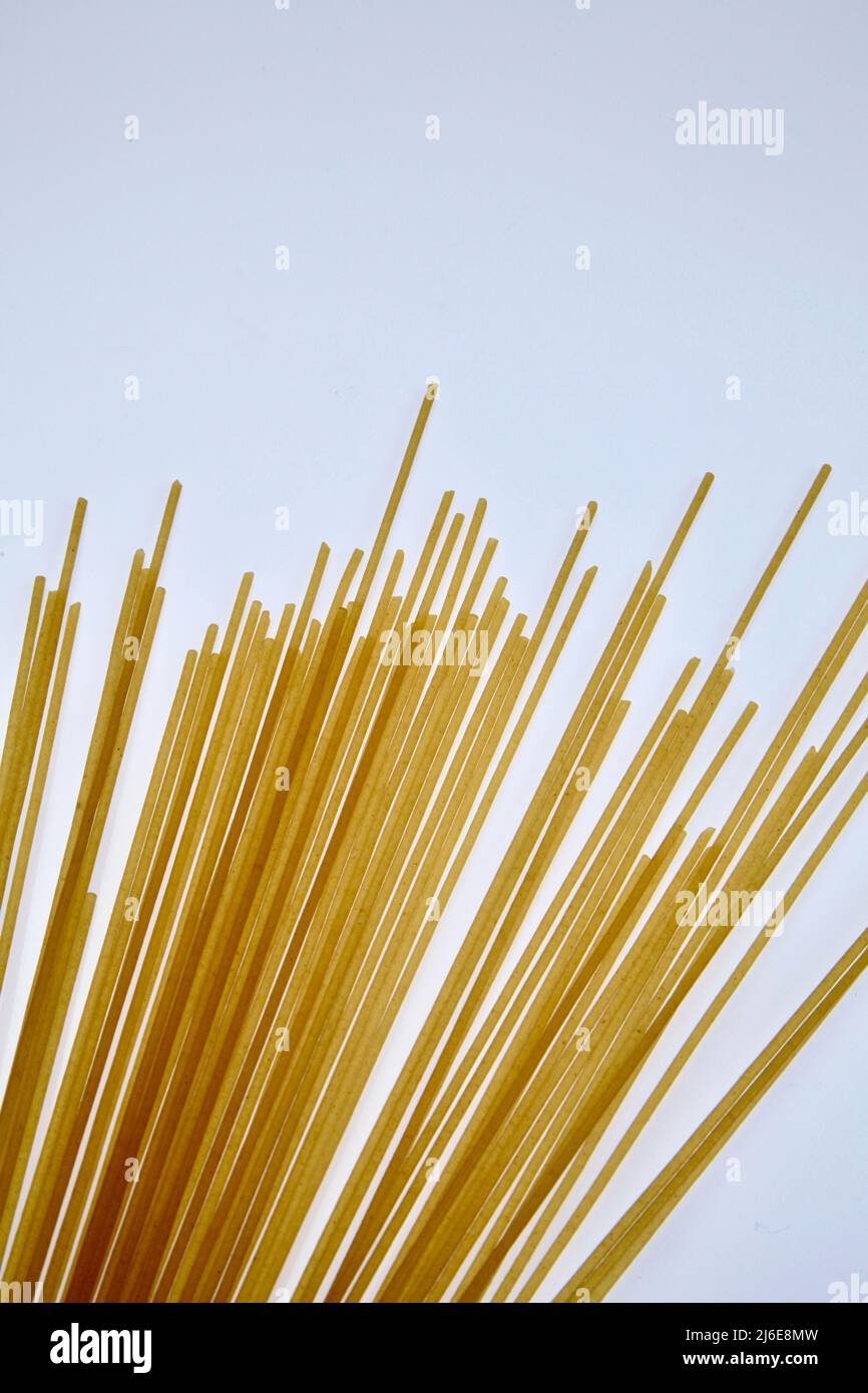 Dry pasta spaghetti and fusilli on white background May 2022 Stock Photo