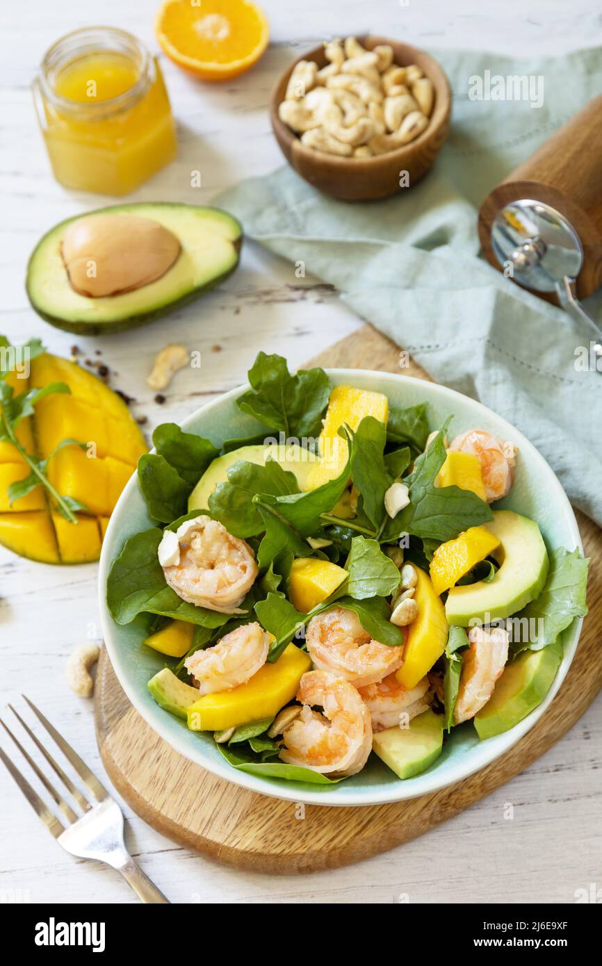 Vegetarian vegan healthy food. Salad with arugula, mango, avocado