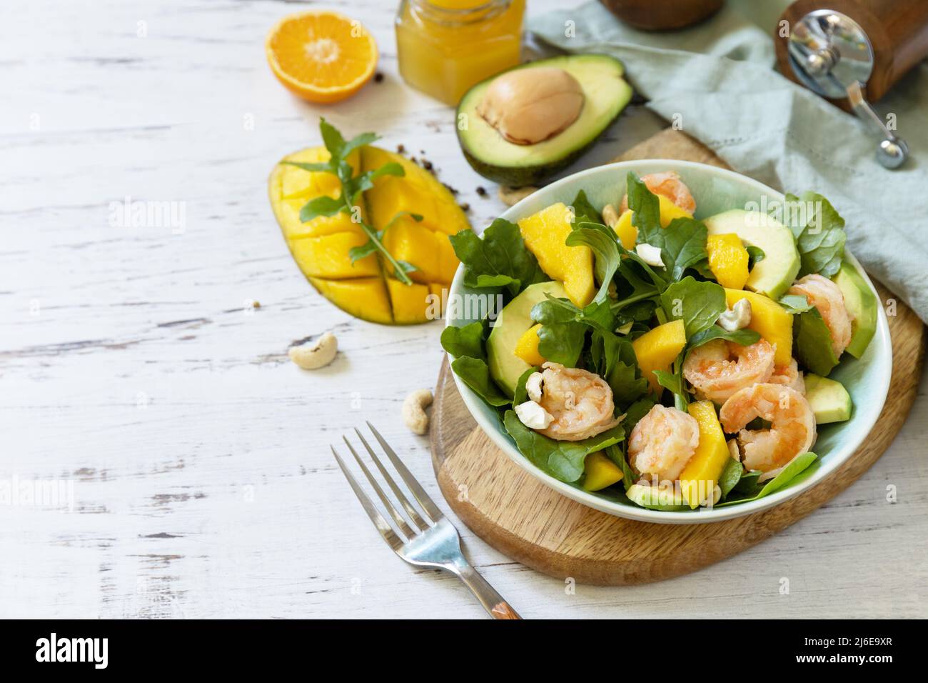 Vegetarian vegan healthy food. Salad with arugula, mango, avocado