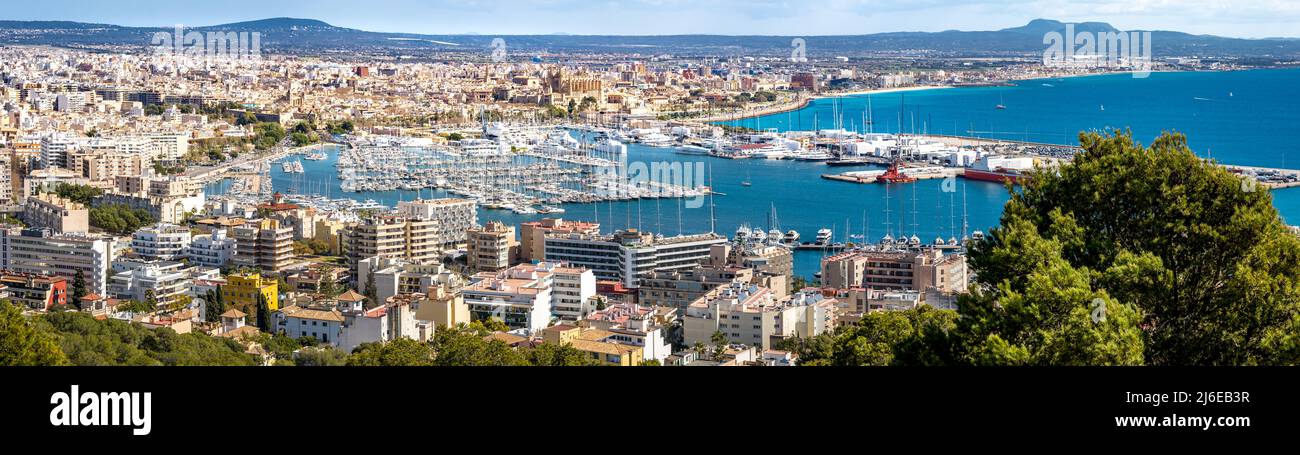 Panorama view from elevated castle Castell de Bellver over the bay of Palma de Mallorca with old town, cathedral La Seu, marina and harbor to airport. Stock Photo