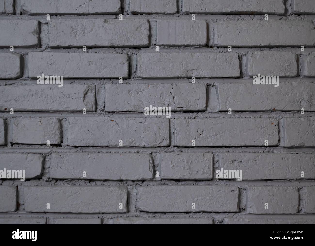 Gray clay bricks wall flat background texture pattern Stock Photo - Alamy