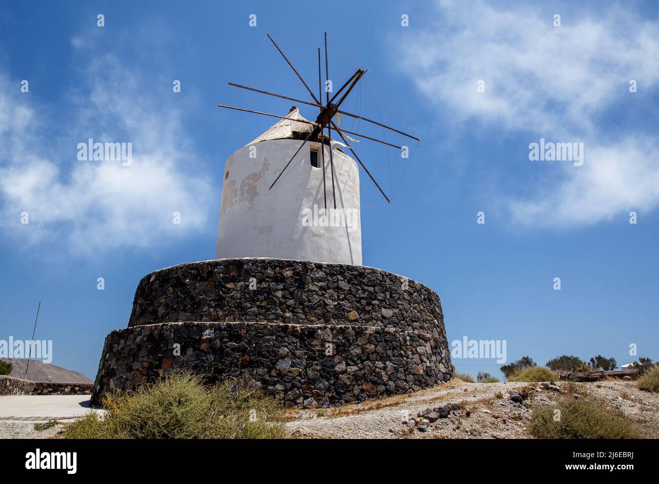Traditional greek windmill of Santorini island Stock Photo