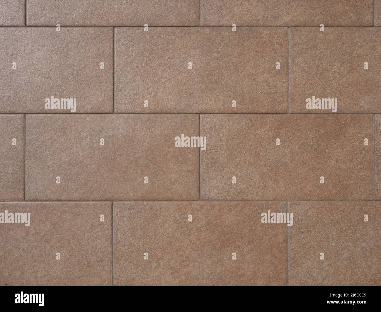 brown ceramic floor tiles useful as a background Stock Photo