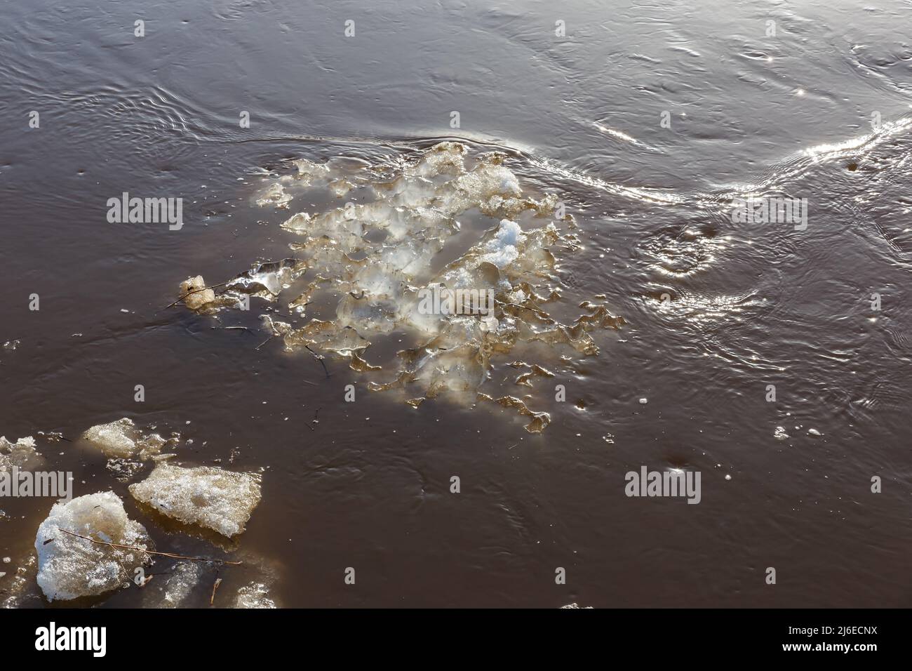 ice floe drifts downstream in springtime. spring flood. Stock Photo