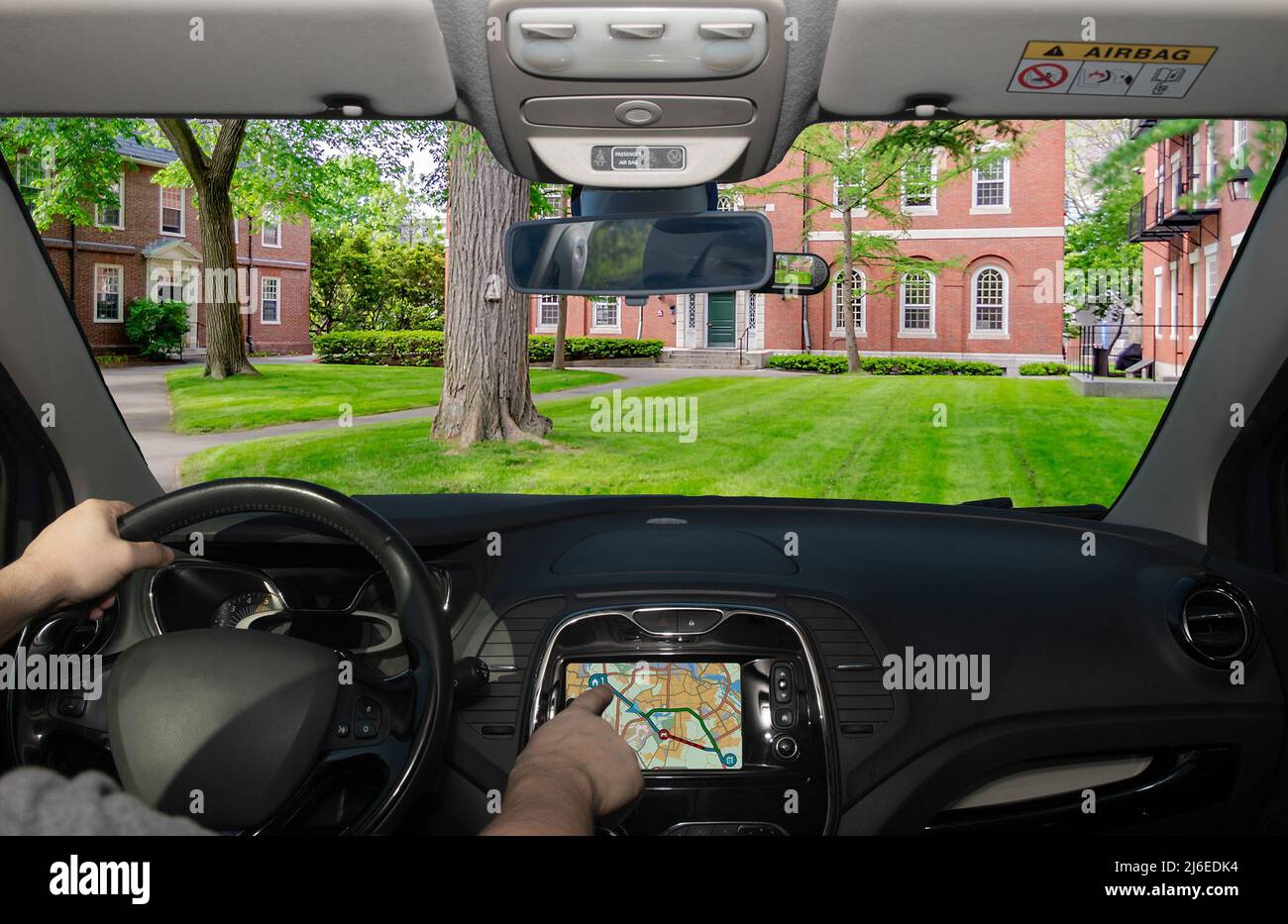 Driving a car while using the touch screen of a GPS navigation system