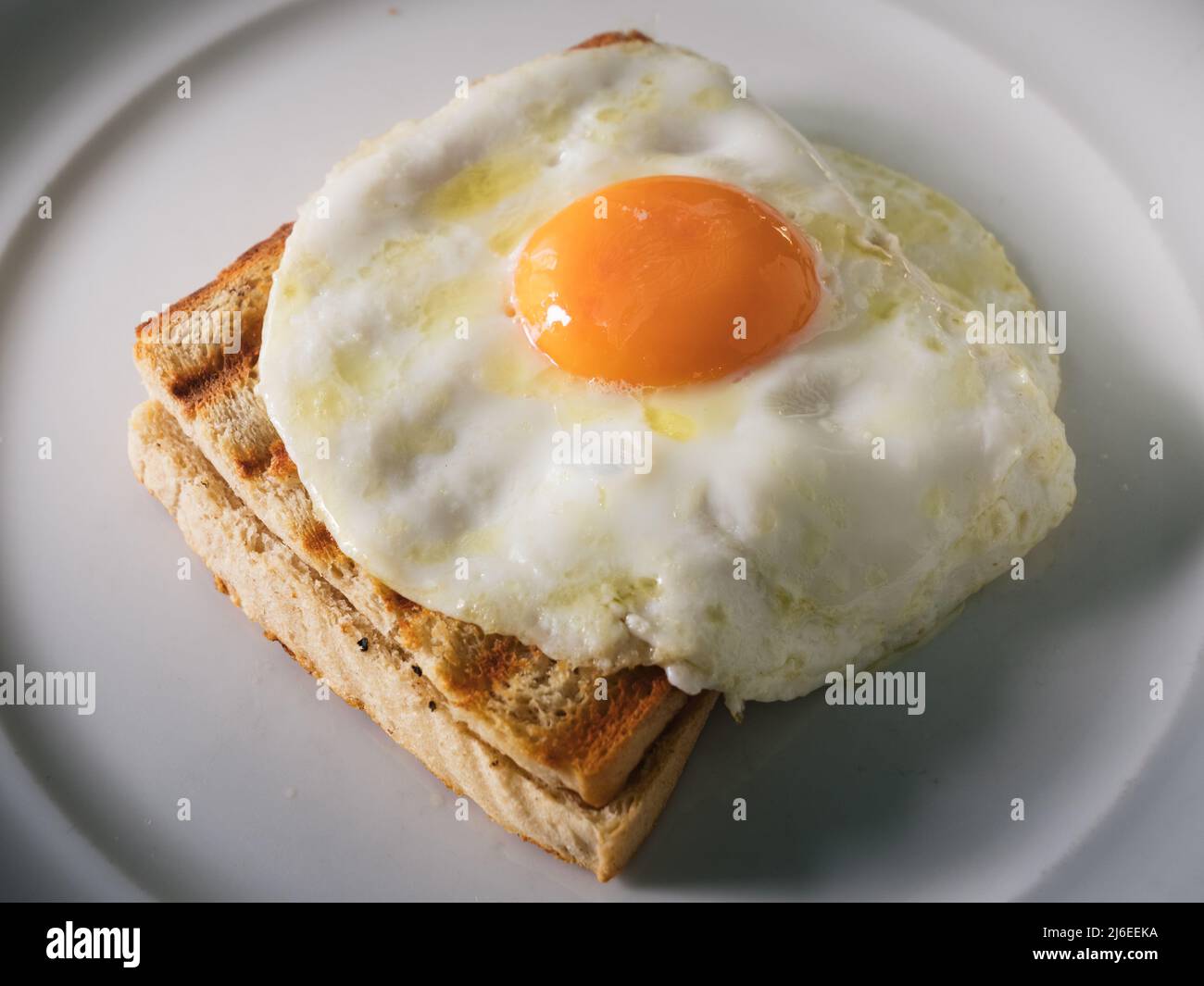 Croque Monsieur Ham and Chees Toast with a Fried Egg Stock Photo