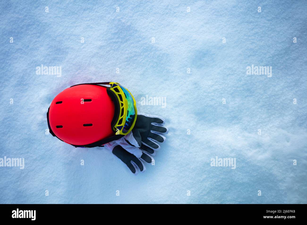 Pink sport helmet with ski mask and winter gloves Stock Photo