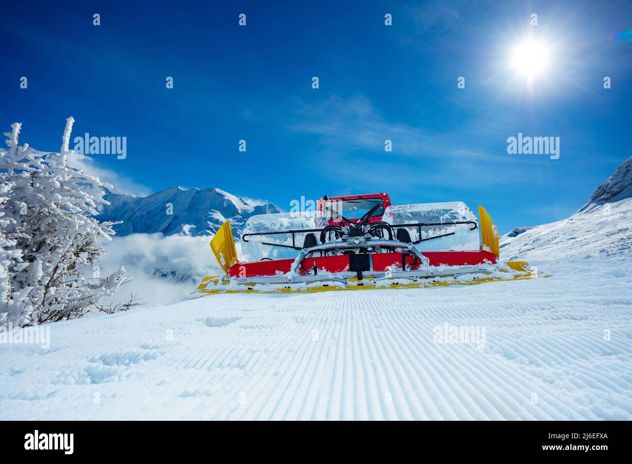 Front view of fresh track from a snow groomer ratrack machine Stock Photo