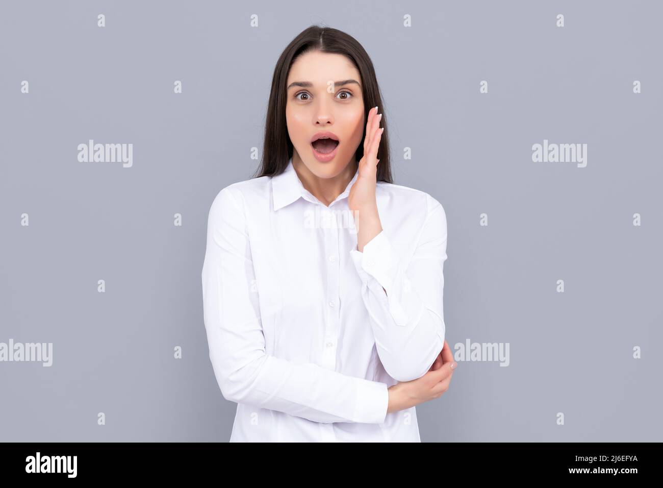 female formal fashion. confident lady boss. amazed businesswoman in white shirt. business success. successful woman in businesslike clothes. manager Stock Photo