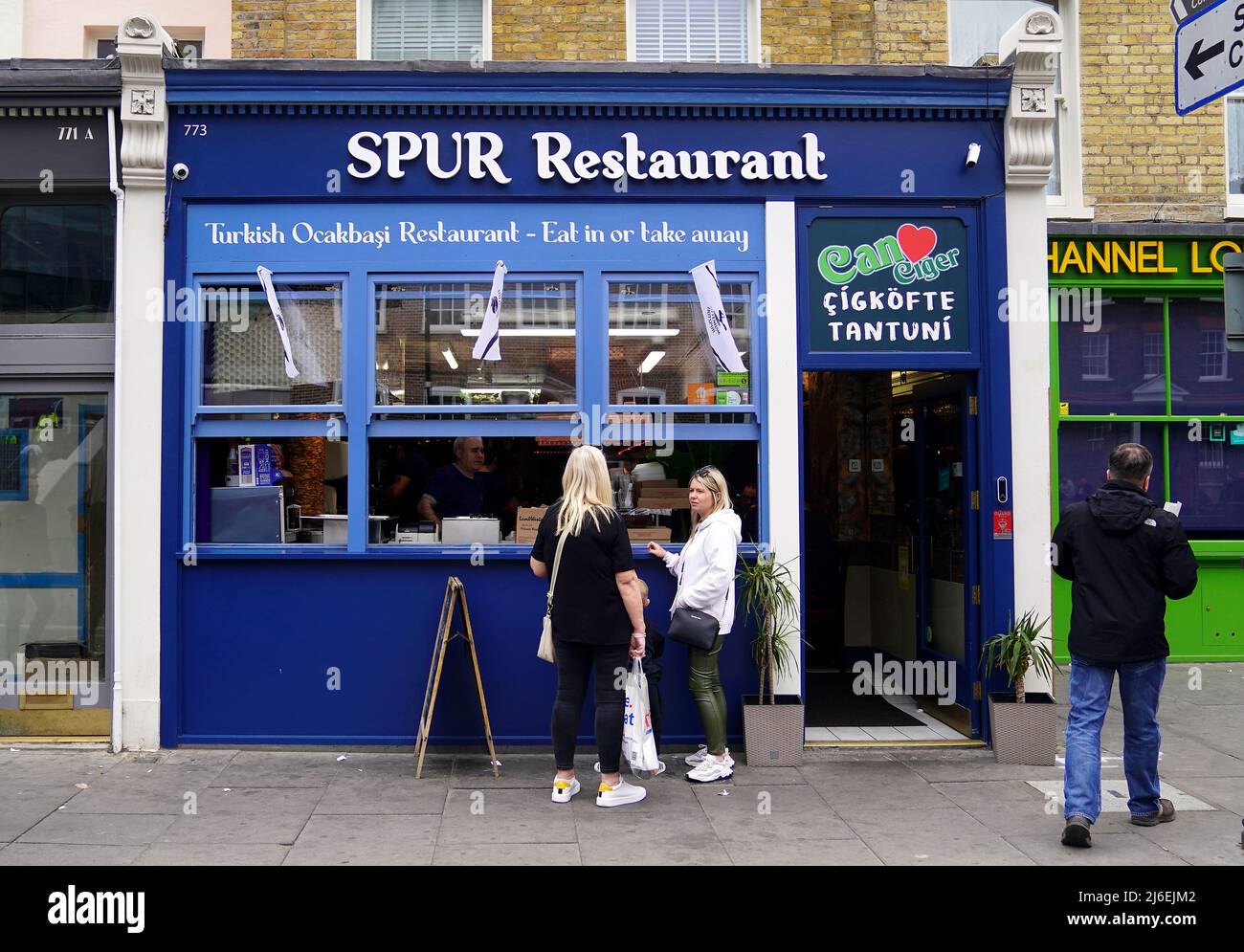 People at the Spur Restaurant near the ground ahead of the Premier League match at the Tottenham Hotspur Stadium, London. Picture date: Sunday May 1, 2022. Stock Photo