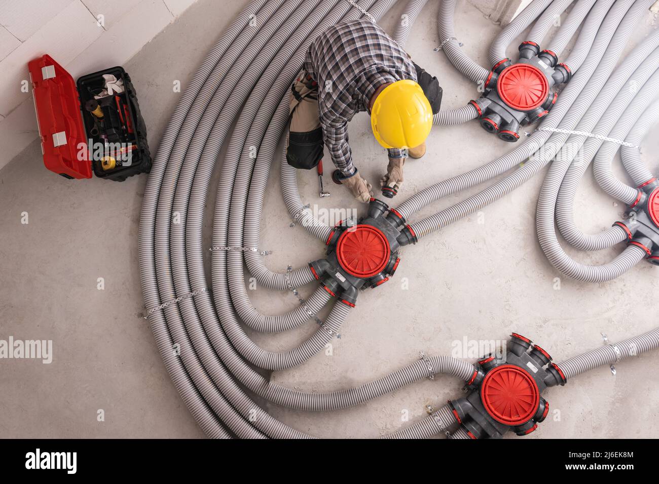 Modern Residential Heat Recuperation System Pipelines Installed by  Professional Caucasian HVAC Technician in His 40s. Heat Ventilation Recovery  Techno Stock Photo - Alamy