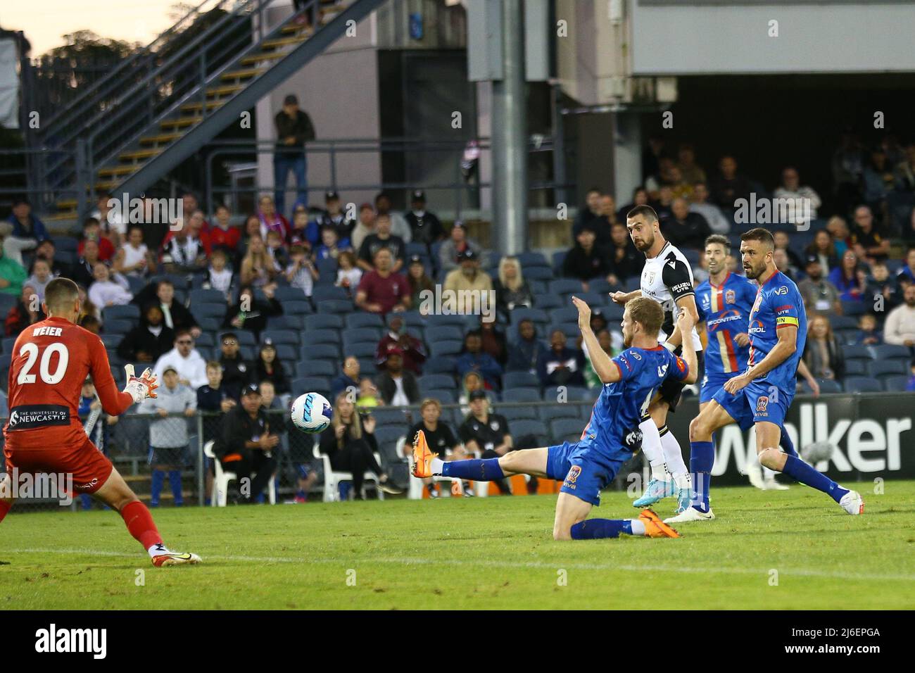 1st May 2022, Campbeltown  Sports Stadium, Sydney, NSW, Australia: A-League football, Macarthur FC versus Newcastle Jets; Tomi Juric of Macarthur FC's effort on goal is stopped by keeper Michael Weier of Newcastle Jets Stock Photo