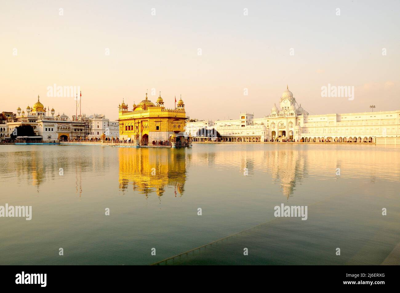 The golden temple of Sikh religion at sunset in Amritsar, Punjab, India. Stock Photo