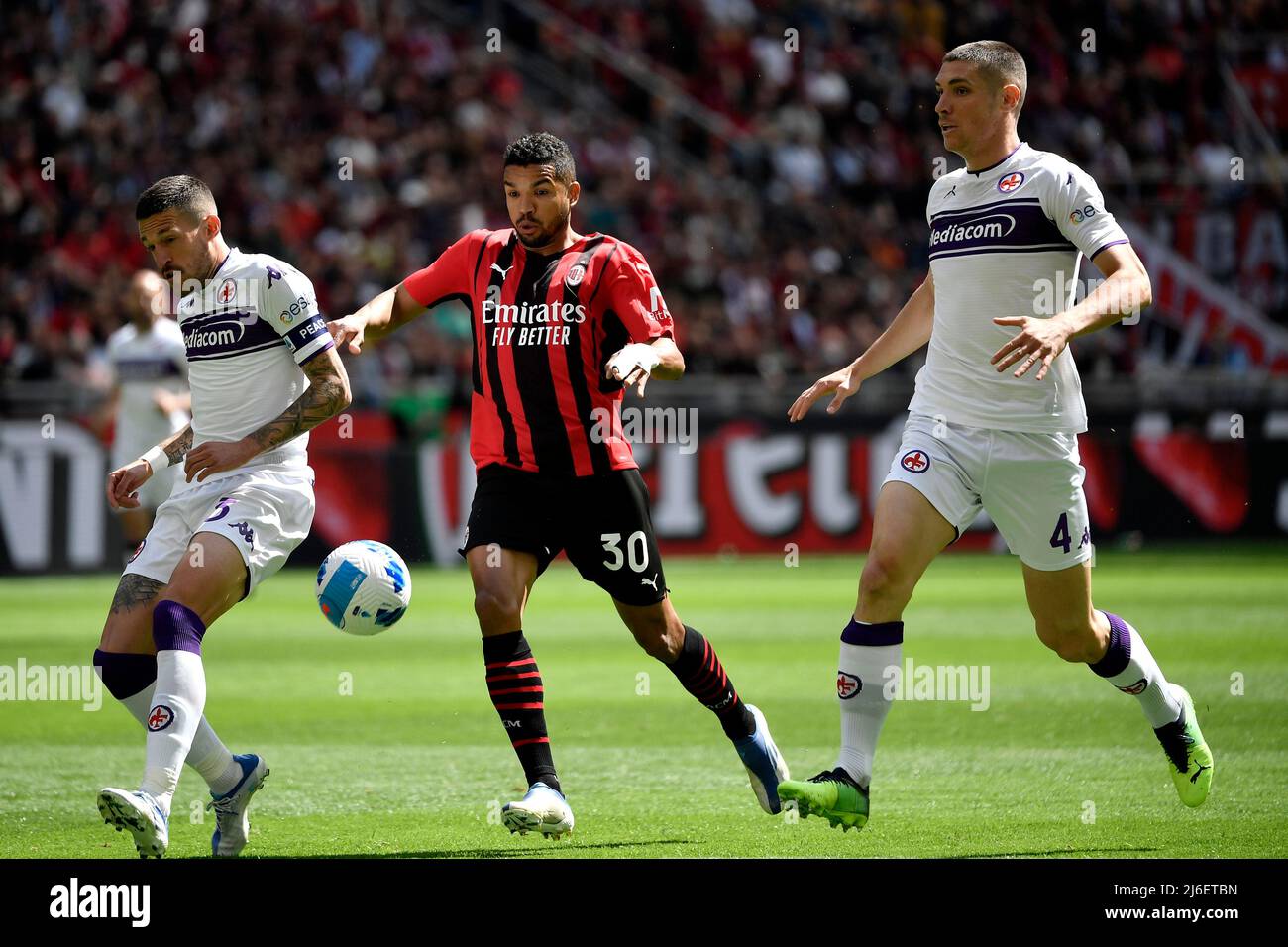 Florence, Italy. 21st May, 2022. Moise Kean of Juventus FC and Nikola  Milenkovic of ACF Fiorentina compete for the ball during the Serie A  2021/2022 football match between ACF Fiorentina and Juventus