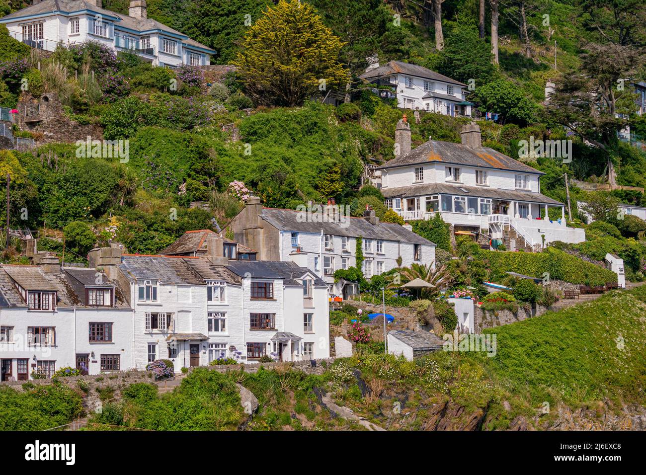 Hillside properties overlooking the harbour at Polperro, southern Cornwall, UK. Stock Photo