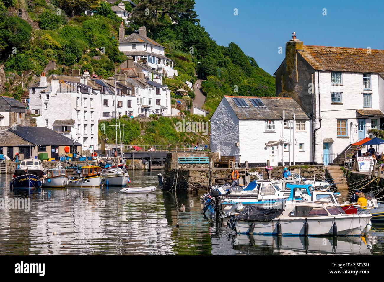 Polperro inner Harbour on a hot July day - Polperro, Cornwall, UK. Stock Photo