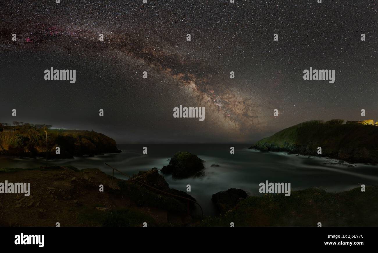 The Milky Way over Cadgwith Cove, Cornwall Stock Photo