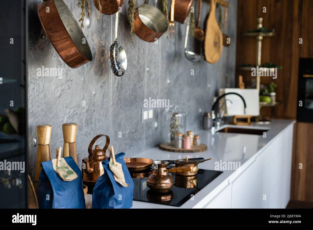 Kitchen wall rack for hanging pots, pans, aprons, and other utensils