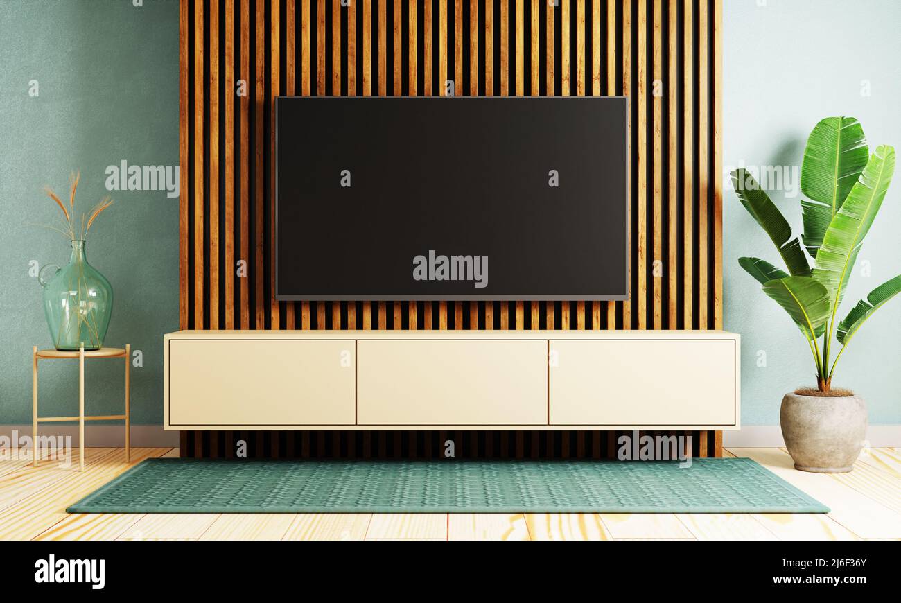 Japanese style modern living room with hanging mockup television tv on wall background. Interior and architecture concept. 3D illustration rendering Stock Photo