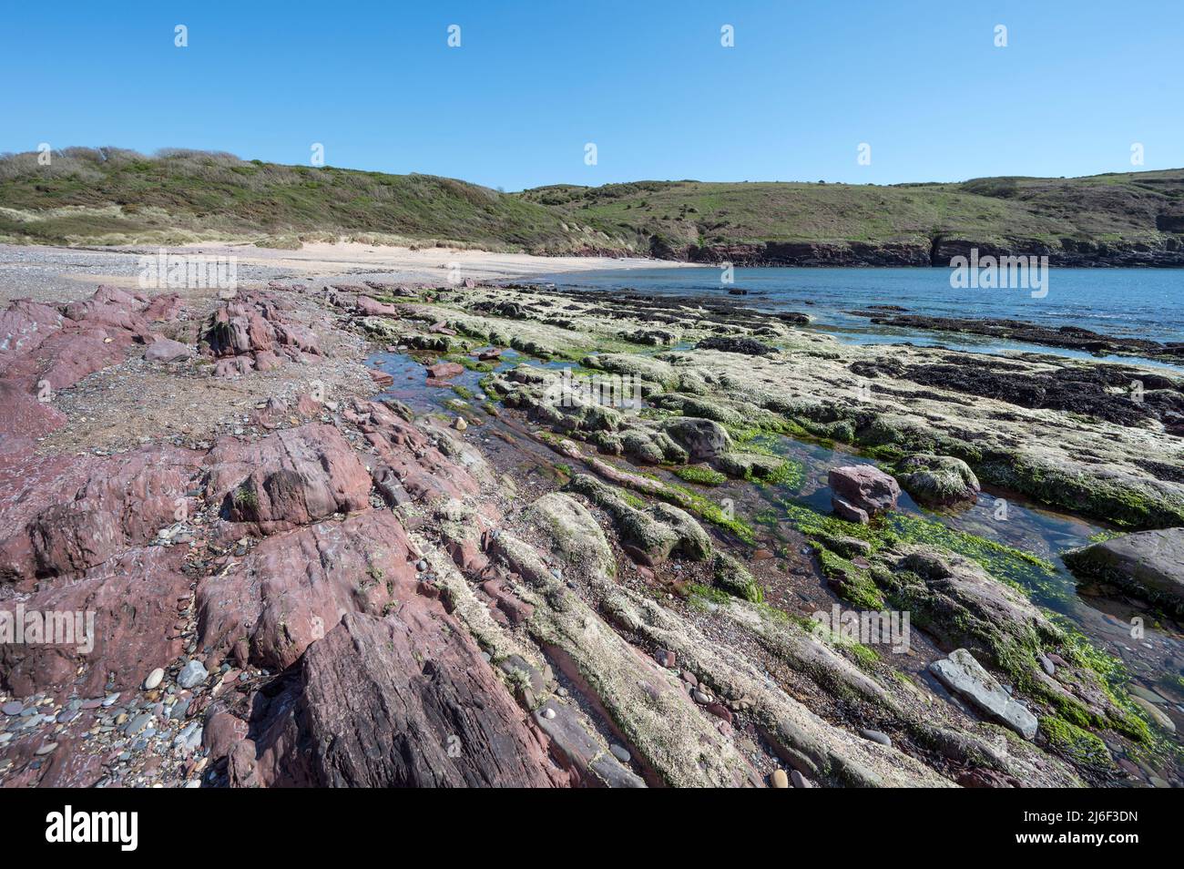 Differenent coloured rocks on Manorbier Beach Pembrokeshire SouthWales ...