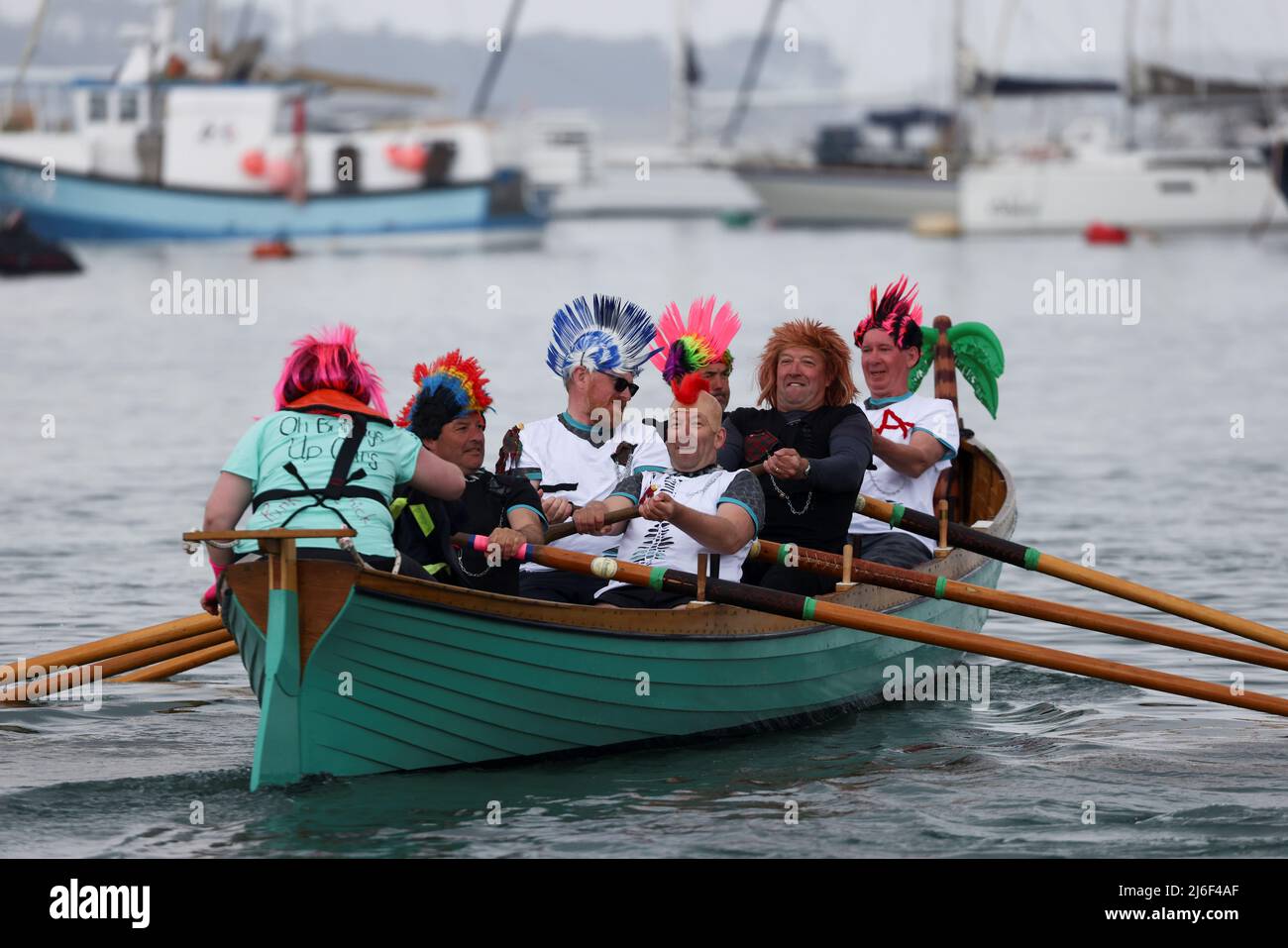 Rowers compete during the World Pilot Gig rowing Championships from Nut Rock to St. Mary's, in the Isles of Scilly, Britain, May 1, 2022. REUTERS/Tom Nicholson Stock Photo